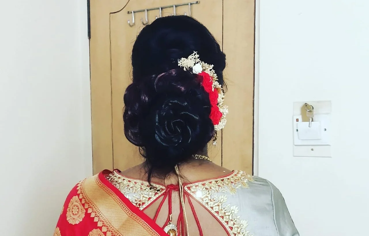 image of a bride with modern hair-do by Srihayaas Bridal Studios