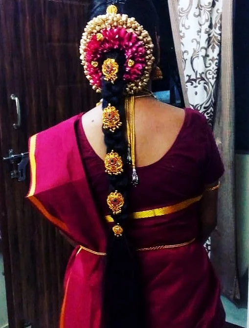 image of a bride with stylish hair-do by Srihayaas Bridal Studios