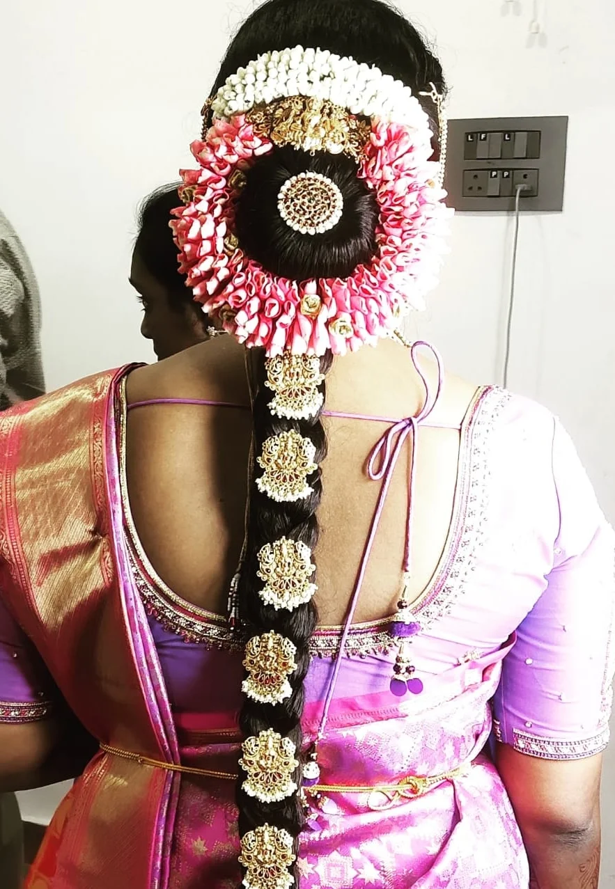 image of a bride with modern hair-do by Srihayaas Bridal Studios